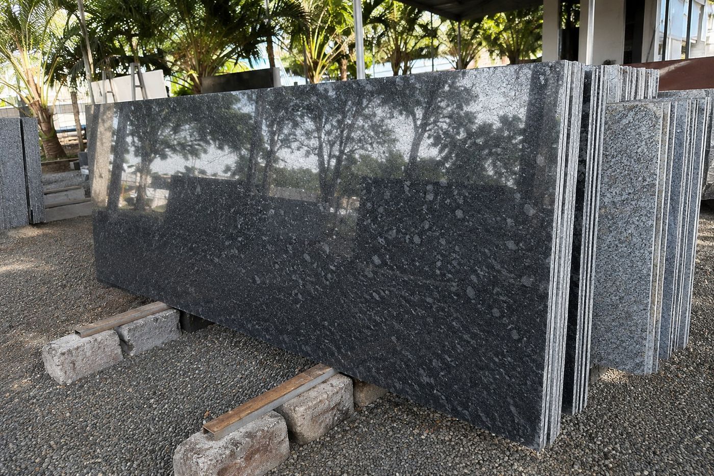 Polished Steel Grey granite slabs at the AMPM yard